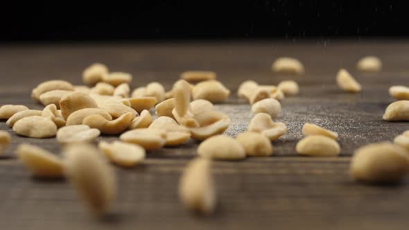 Purified peanuts are thrown up in beautiful slow motion