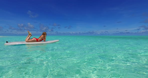 Happy couple in love dating on vacation spend quality time on beach on clean white sand background 