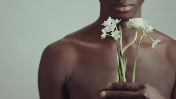 Shirtless Man With Beautiful Flowers