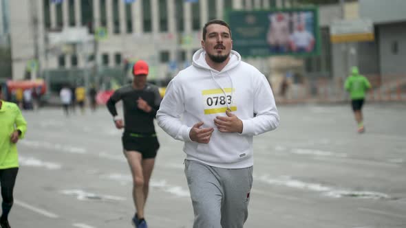 Male Sportsman with Fat Body Build on Marathon Running Event Among Athletes