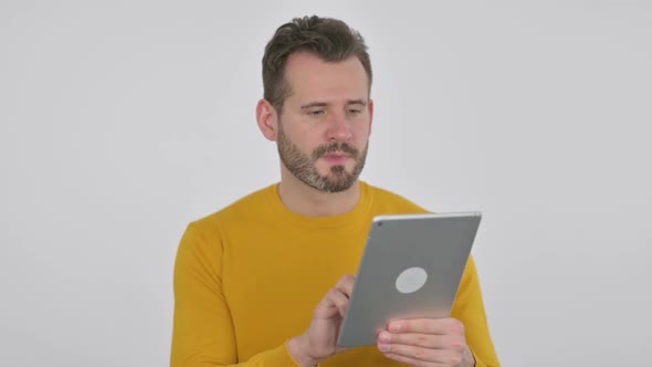 Portrait of Attractive Middle Aged Man Using Tablet in Office