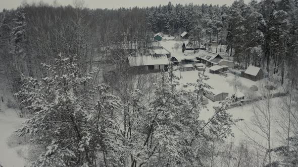 Winter Landscape of a Russian Village in the Forest