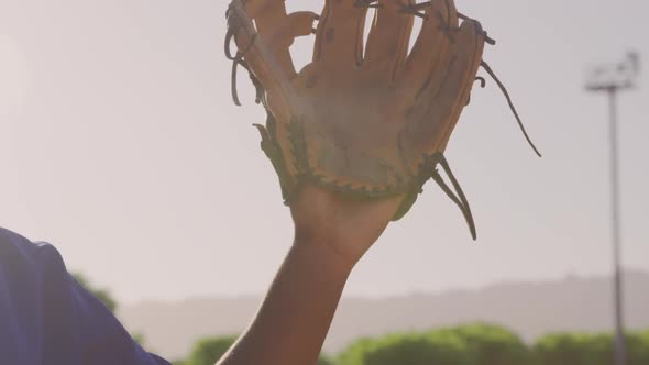 Baseball player catching a ball during a match