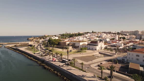 Aerial slide overlook Lagos Promenade along Descobrimentos Avenue, Algarve