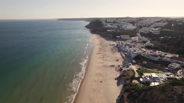 Seafront real estate overlooking Salema sand beach and Atlantic Ocean.