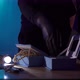 Robber in a Balaclava Steals Jewelry and Money From a Table - VideoHive Item for Sale