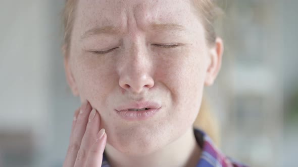 Close Up of Young Woman Having Tooth Ache