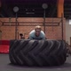 Fitness Woman Doing Big Tire Flips Workout at Gym - VideoHive Item for Sale