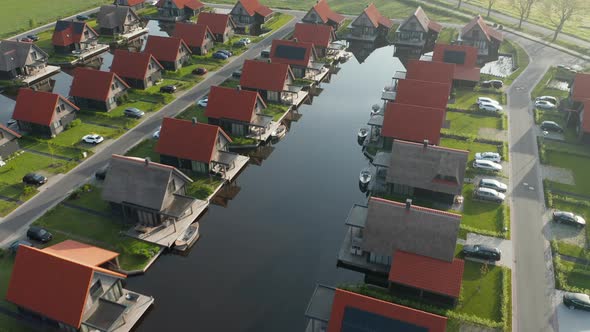 Luxurious Holiday Resort And Polder With Boats On Jetty At Waterstaete Ossenzijl In Netherlands. - a