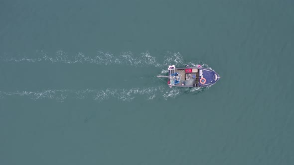 Bird's Eye View of.a Fishing Vessel Returning to Port