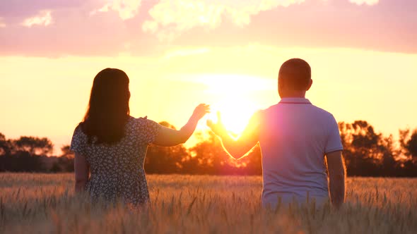 Happy Family at Sunset