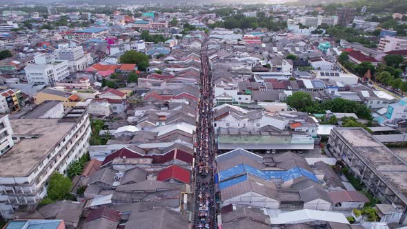 Aerial view over phuket city Thailand.Drone over a street night market in Sunday at Phuket Town