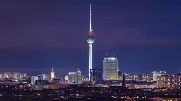 Stormy Night Time Lapse of Berlin cityscape with tv tower, Berlin, Germany