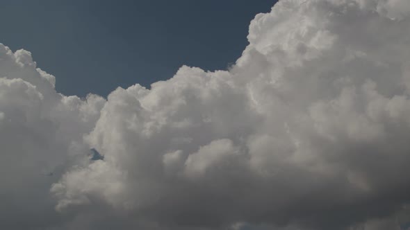 White Rain Clouds Moving Blue Sky