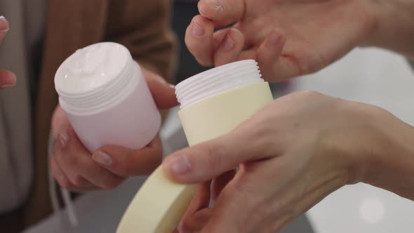 Buying Cream In Cosmetics Store