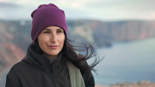 Smiling Female Hiker Walking on Top High Mountain Enjoying Trekking Travel Trip Medium Closeup