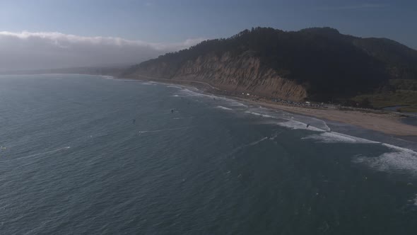 Aerial Drone Shot of a Beach Kiteboarders and Windsurfers (Waddell Beach, Pacific Coast Highway, CA)