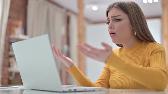 Disappointed Young Woman Reacting To Failure on Laptop 