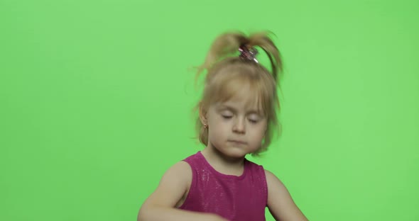 Girl Child in Purple Dress Waving with Hands. Make Faces and Smile. Chroma Key