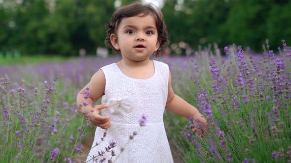 Mother Playing with Baby in Lavender Field