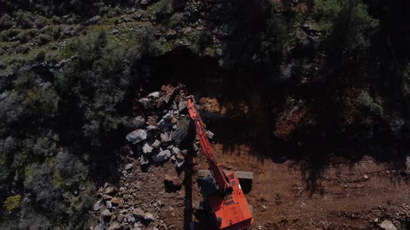 The İmage of the Excavator Moving Upwards