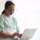 Sick Asian woman using laptop while staying at hospital room. - VideoHive Item for Sale