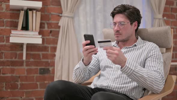 Middle Aged Man Unsuccessful Online Payment on Smartphone