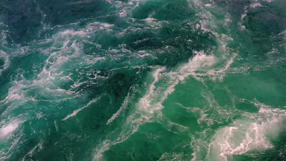 Waves of Water of the River and the Sea Meet Each Other