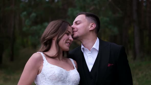 Young Sexy Couple Expressing Feelings in the Park