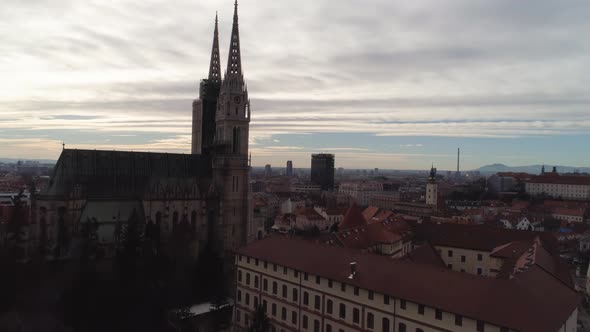 Zagreb Cathedral Aerial Rise Up Shot At Sunset, Croatia