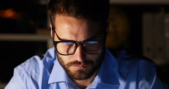 Businessman working at night