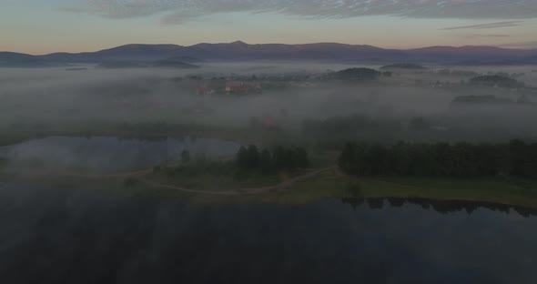 Aerail Over Lake In Fog 4