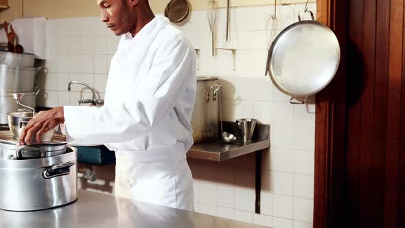 Portrait of chef standing with arms crossed