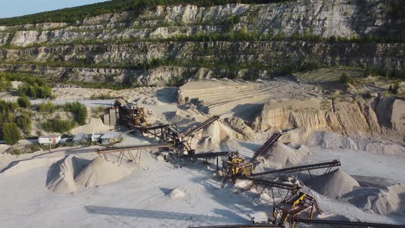 Aerial view opencast mining limestone quarry.