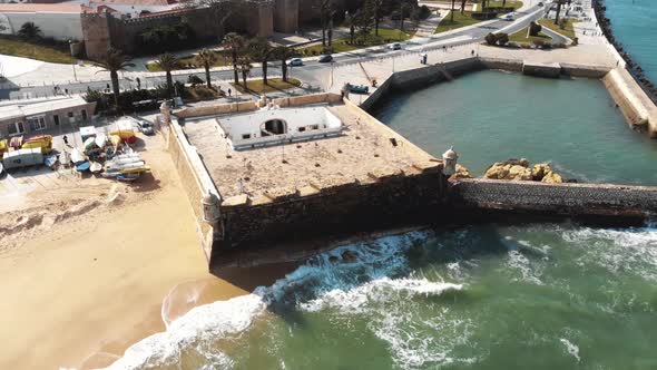 Top view of Fort of Ponta da Bandeira in Lagos, Algarve, Portugal - Aerial slow Orbit