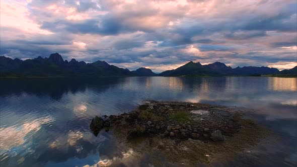 Flying above rocky islet on Vesteralen islands in Norway