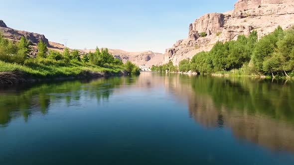 The River Flowing Into The Canyon