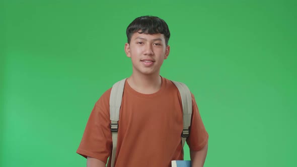 Asian Boy Student Walking To School On Green Screen