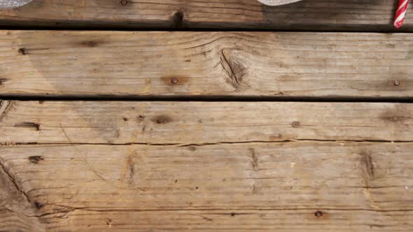 Candy cane with christmas decoration on wooden table 4k