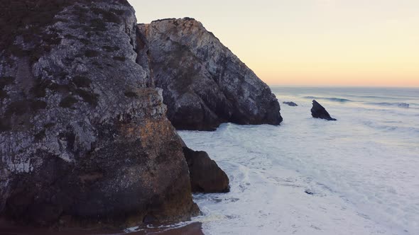 Aerial Drone View of Portugal Atlantic Coast at Lisbon, a Dramatic Rugged Rocky Coastline with Waves