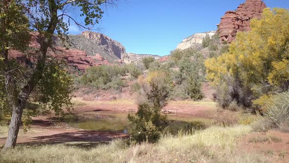 Rotating pan of stagnant pond in the desert during Fall