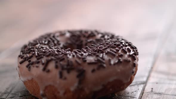 Chocolate doughnut falling. Slow Motion. alt