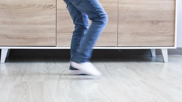 Boy Dancing Legs in Blue Jeans