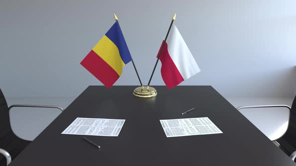 Flags of Romania and Poland and Papers alt