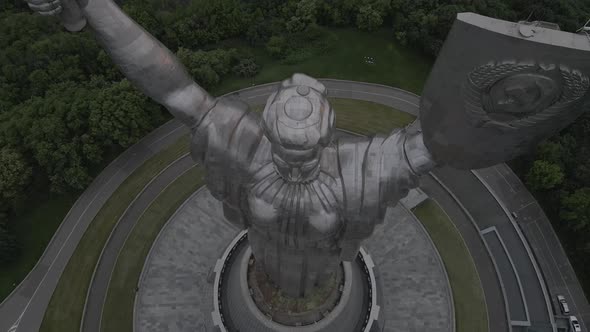 Aerial View of the Monument of Motherland in Kyiv Traffic on the Roads