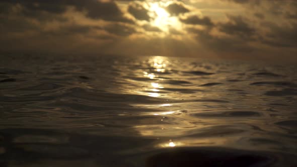 View of a scenic tropical island at sunset in the Maldives.