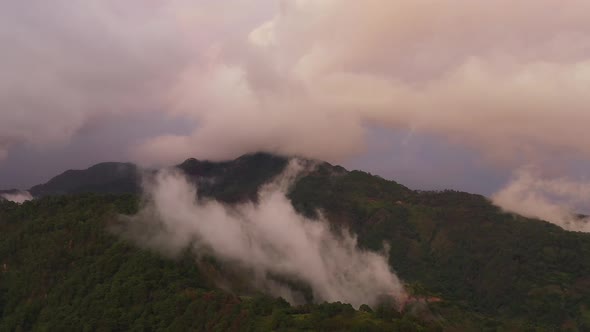 Mountain Peaks Covered with Fluffy Clouds During Sunset. Cordillera on Luzon Island, Philippines