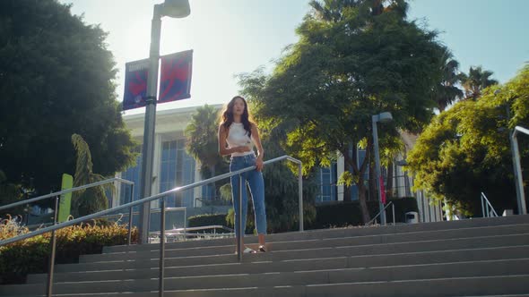 Young Woman Making Selfie on Stairs