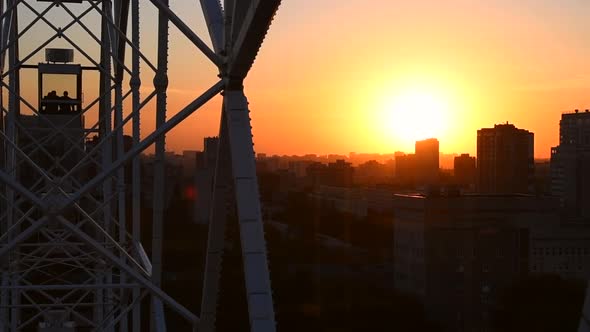 Ferris wheel point of view at sunset