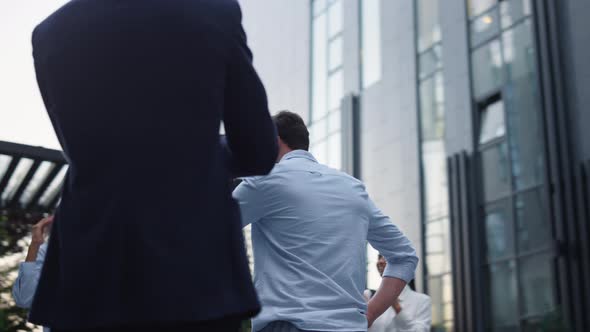 Work Team Applause Leader at Office Building